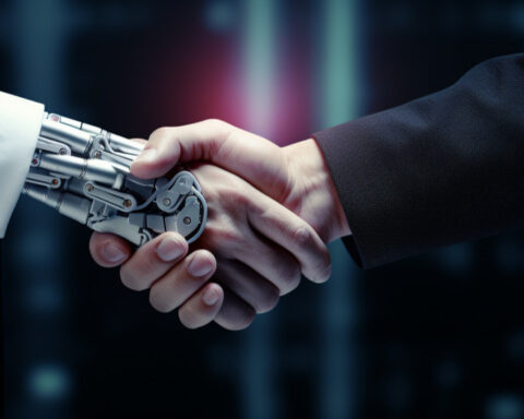Robot estrecha la mano a un ejecutivo.