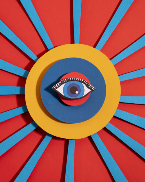Ojo al centro de ilustración representando la idea de vigilancia y poder